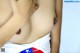 A close up of a woman's breasts with an American flag on it.